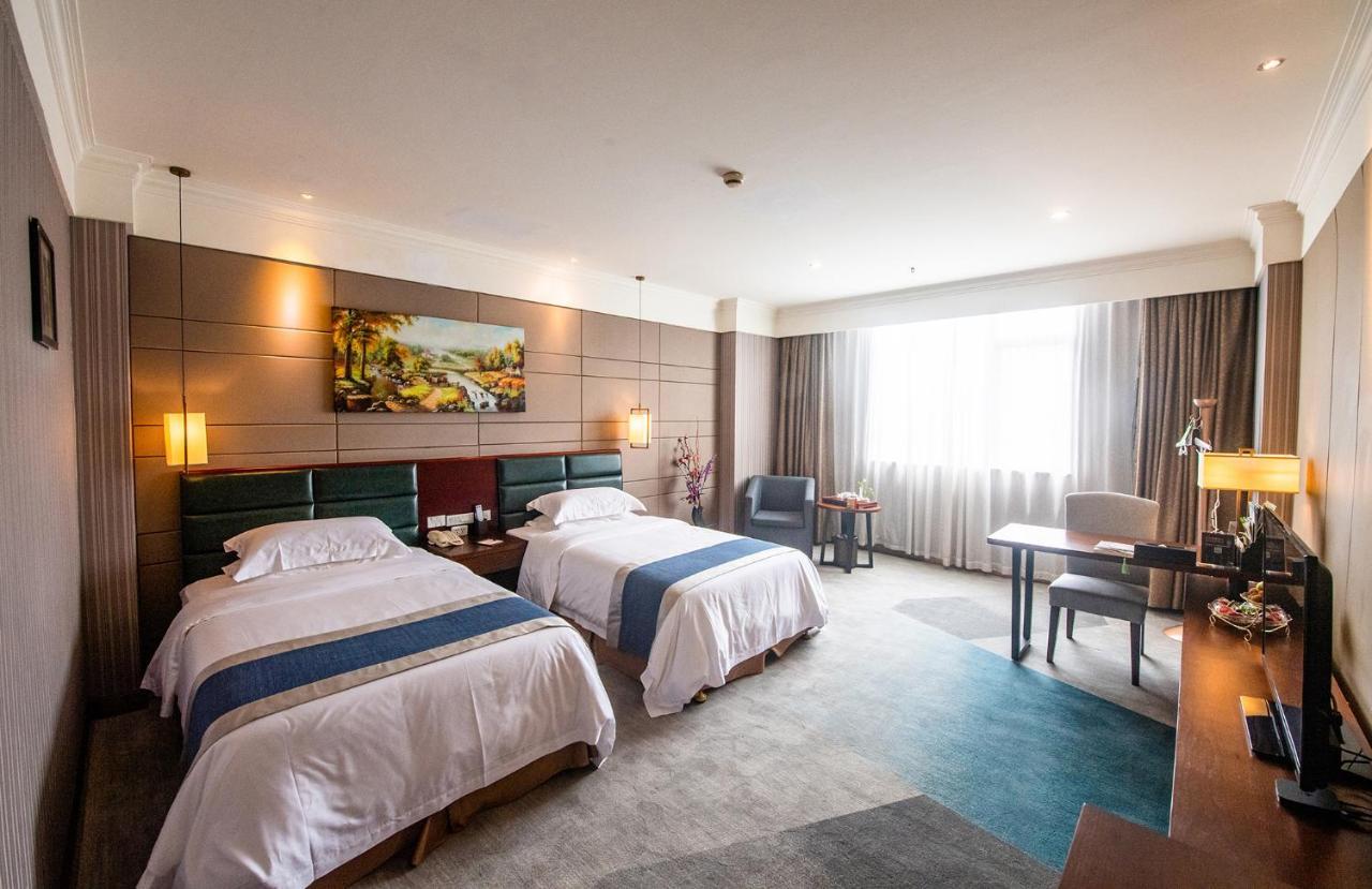 Peace International Hotel Shangrao Esterno foto